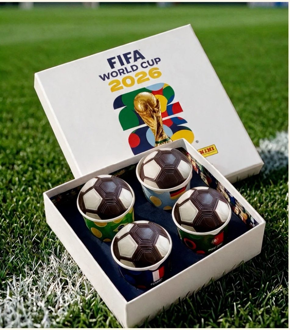 Limited-edition box of four chocolate football gelato cups on grass