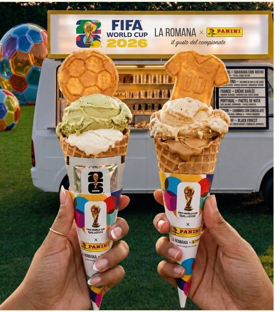 Two hands hold jersey-shaped cones with chocolate football and shirt toppers